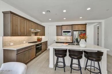 This brand-new Acacia floorplan home in Trilogy at Verde River on Vista Verde Golf Course in Arizona - for sale on GolfHomes.com, golf home, golf lot