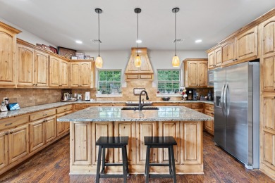 Situated on an oversized corner lot in the gated community of on The Coves Golf Course in Oklahoma - for sale on GolfHomes.com, golf home, golf lot