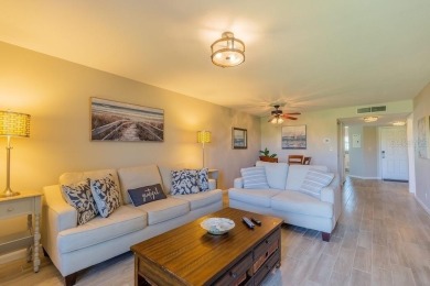 Location, lifestyle, and leisure await! Nestled in a beautifully on Isla Del Sol Yacht and Country Club in Florida - for sale on GolfHomes.com, golf home, golf lot