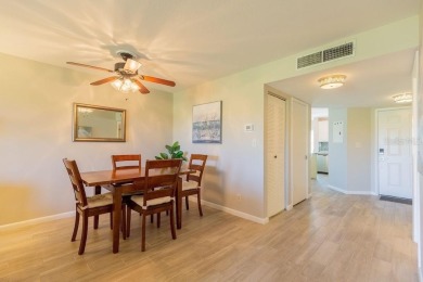 Location, lifestyle, and leisure await! Nestled in a beautifully on Isla Del Sol Yacht and Country Club in Florida - for sale on GolfHomes.com, golf home, golf lot