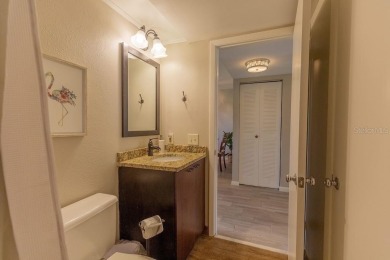 Location, lifestyle, and leisure await! Nestled in a beautifully on Isla Del Sol Yacht and Country Club in Florida - for sale on GolfHomes.com, golf home, golf lot