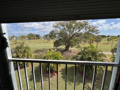 Spacious 2BR/2BA lakefront condo in desirable Palm Springs #2 on  in Florida - for sale on GolfHomes.com, golf home, golf lot