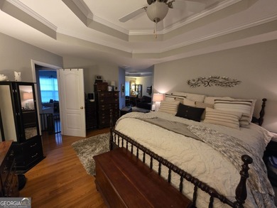 Welcome to this beautifully maintained all-brick home, ideally on Canongate At Georgia National Golf Club in Georgia - for sale on GolfHomes.com, golf home, golf lot