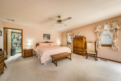 Welcome to your dream home nestled on a quiet, tree-lined on Indian Hills Country Club in Arkansas - for sale on GolfHomes.com, golf home, golf lot