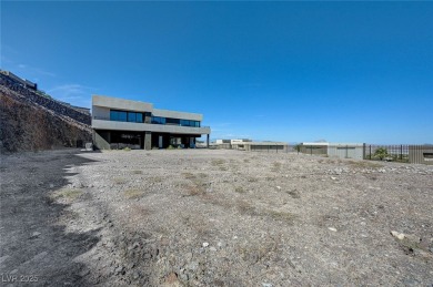 This 7,695 sq. ft. Blue Heron residence sits on a rare 1.23-acre on Dragon Ridge Country Club in Nevada - for sale on GolfHomes.com, golf home, golf lot