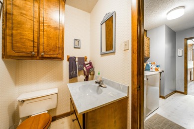 Welcome to your dream home nestled on a quiet, tree-lined on Indian Hills Country Club in Arkansas - for sale on GolfHomes.com, golf home, golf lot