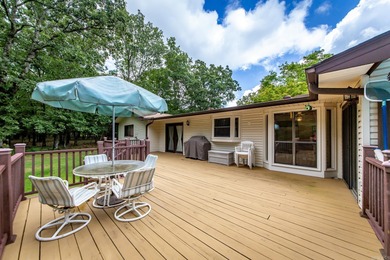 Welcome to your dream home nestled on a quiet, tree-lined on Indian Hills Country Club in Arkansas - for sale on GolfHomes.com, golf home, golf lot