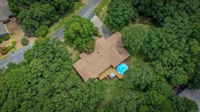 Welcome to your dream home nestled on a quiet, tree-lined on Indian Hills Country Club in Arkansas - for sale on GolfHomes.com, golf home, golf lot