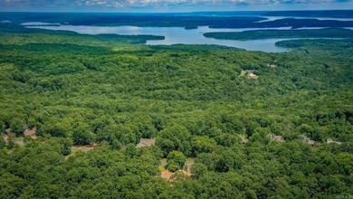 Welcome to your dream home nestled on a quiet, tree-lined on Indian Hills Country Club in Arkansas - for sale on GolfHomes.com, golf home, golf lot
