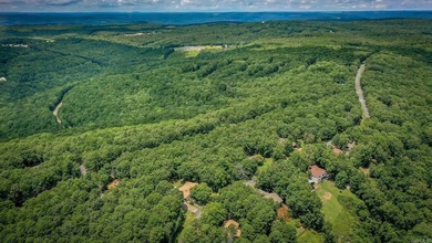 Welcome to your dream home nestled on a quiet, tree-lined on Indian Hills Country Club in Arkansas - for sale on GolfHomes.com, golf home, golf lot