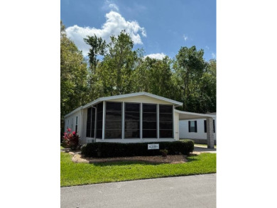 Looking for the perfect, move-in-ready retreat in a thriving 55+ on Hamptons Golf Club in Florida - for sale on GolfHomes.com, golf home, golf lot