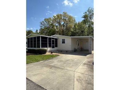 Looking for the perfect, move-in-ready retreat in a thriving 55+ on Hamptons Golf Club in Florida - for sale on GolfHomes.com, golf home, golf lot