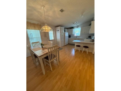 Looking for the perfect, move-in-ready retreat in a thriving 55+ on Hamptons Golf Club in Florida - for sale on GolfHomes.com, golf home, golf lot