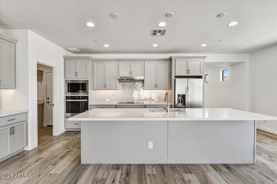 Located in the prestigious Trilogy at Verde River community on Vista Verde Golf Course in Arizona - for sale on GolfHomes.com, golf home, golf lot