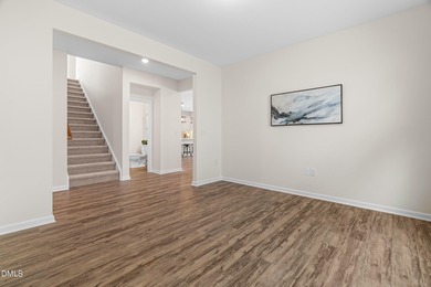 Step into turnkey perfection in the coveted 12 Oaks community on The Club At Twelve Oaks in North Carolina - for sale on GolfHomes.com, golf home, golf lot