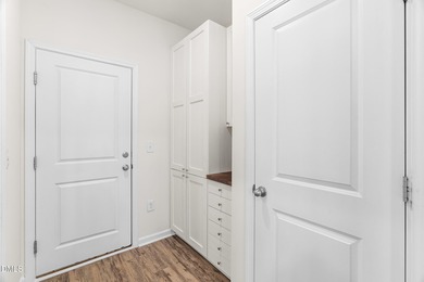 Step into turnkey perfection in the coveted 12 Oaks community on The Club At Twelve Oaks in North Carolina - for sale on GolfHomes.com, golf home, golf lot