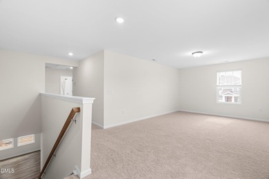 Step into turnkey perfection in the coveted 12 Oaks community on The Club At Twelve Oaks in North Carolina - for sale on GolfHomes.com, golf home, golf lot