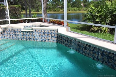 This home is located on a quiet street with the natural settings on Eagle Marsh Golf Club in Florida - for sale on GolfHomes.com, golf home, golf lot