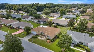 ROOF 2024! AC 2017! This spacious PALM 2 Model in Spruce Creek on Preserve Golf Club in Florida - for sale on GolfHomes.com, golf home, golf lot