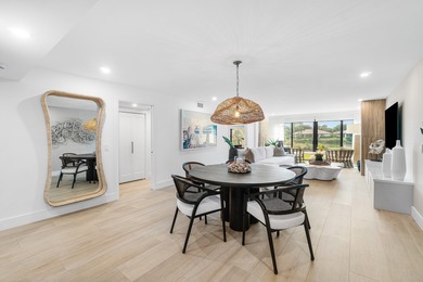 Unparalleled lake and golf course vistas set the stage for this on Quail Ridge Golf Course and Country Club in Florida - for sale on GolfHomes.com, golf home, golf lot