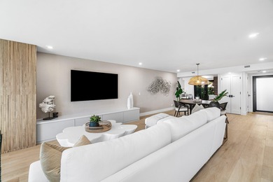 Unparalleled lake and golf course vistas set the stage for this on Quail Ridge Golf Course and Country Club in Florida - for sale on GolfHomes.com, golf home, golf lot