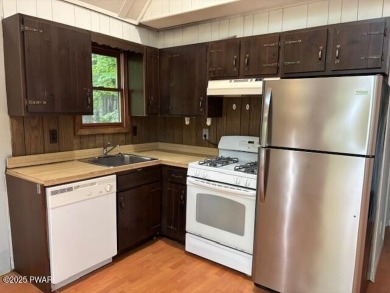 A little elbow grease and your finishing touches will provide on The Hideout Golf in Pennsylvania - for sale on GolfHomes.com, golf home, golf lot
