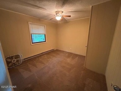A little elbow grease and your finishing touches will provide on The Hideout Golf in Pennsylvania - for sale on GolfHomes.com, golf home, golf lot