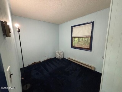 A little elbow grease and your finishing touches will provide on The Hideout Golf in Pennsylvania - for sale on GolfHomes.com, golf home, golf lot