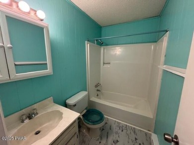 A little elbow grease and your finishing touches will provide on The Hideout Golf in Pennsylvania - for sale on GolfHomes.com, golf home, golf lot