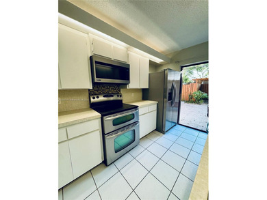 2 Bedroom 2.5 Baths plus additional Room (can be a 3rd Bedroom on Pine Island Ridge Country Club in Florida - for sale on GolfHomes.com, golf home, golf lot