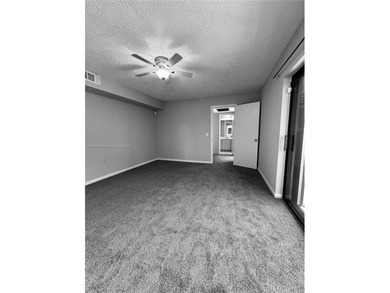 2 Bedroom 2.5 Baths plus additional Room (can be a 3rd Bedroom on Pine Island Ridge Country Club in Florida - for sale on GolfHomes.com, golf home, golf lot