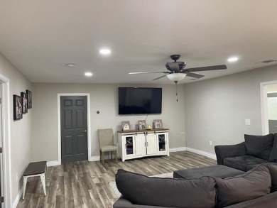 Welcome to your dream home! This beautifully remodeled 4-bedroom on Levelland Country Club in Texas - for sale on GolfHomes.com, golf home, golf lot