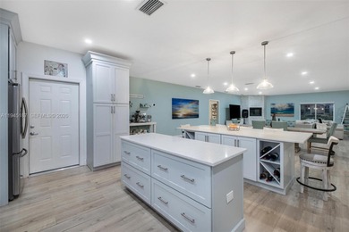 Welcome to luxury living in this stunning 4-bedroom, 3.5-bath on Redland Golf and Country Club in Florida - for sale on GolfHomes.com, golf home, golf lot