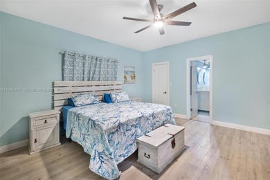 Welcome to luxury living in this stunning 4-bedroom, 3.5-bath on Redland Golf and Country Club in Florida - for sale on GolfHomes.com, golf home, golf lot