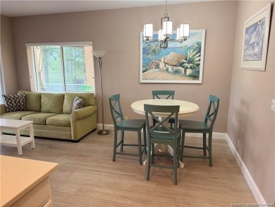 This exquisite first-floor condominium boasts unobstructed views on The Legacy Golf and Tennis Club in Florida - for sale on GolfHomes.com, golf home, golf lot
