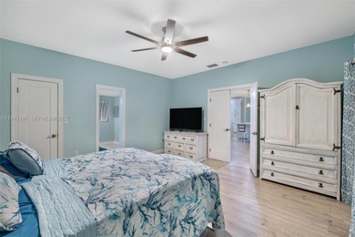 Welcome to luxury living in this stunning 4-bedroom, 3.5-bath on Redland Golf and Country Club in Florida - for sale on GolfHomes.com, golf home, golf lot