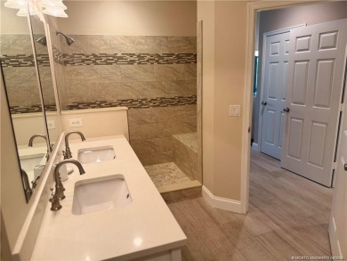 This exquisite first-floor condominium boasts unobstructed views on The Legacy Golf and Tennis Club in Florida - for sale on GolfHomes.com, golf home, golf lot