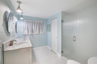 Welcome to luxury living in this stunning 4-bedroom, 3.5-bath on Redland Golf and Country Club in Florida - for sale on GolfHomes.com, golf home, golf lot