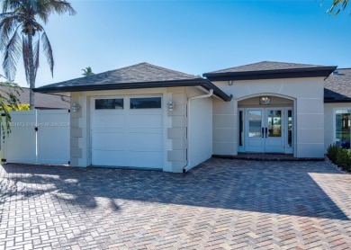 This furnished-remodeled Gulf Access home, nestled at the end of on Royal Tee Country Club in Florida - for sale on GolfHomes.com, golf home, golf lot