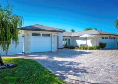 This furnished-remodeled Gulf Access home, nestled at the end of on Royal Tee Country Club in Florida - for sale on GolfHomes.com, golf home, golf lot