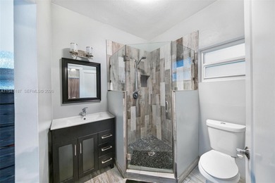 Welcome to luxury living in this stunning 4-bedroom, 3.5-bath on Redland Golf and Country Club in Florida - for sale on GolfHomes.com, golf home, golf lot