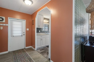 UPDATED INTERIOR - CORNER LOT - FURNISHED! This spacious on High Point Golf Club, Inc. in Florida - for sale on GolfHomes.com, golf home, golf lot