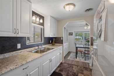UPDATED INTERIOR - CORNER LOT - FURNISHED! This spacious on High Point Golf Club, Inc. in Florida - for sale on GolfHomes.com, golf home, golf lot