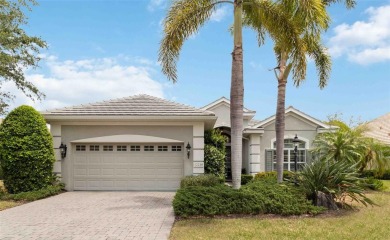 Experience luxury, privacy, and sophistication in this stunning on Lakewood Ranch Golf and Country Club in Florida - for sale on GolfHomes.com, golf home, golf lot