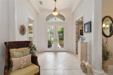 Experience luxury, privacy, and sophistication in this stunning on Lakewood Ranch Golf and Country Club in Florida - for sale on GolfHomes.com, golf home, golf lot