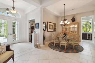 Experience luxury, privacy, and sophistication in this stunning on Lakewood Ranch Golf and Country Club in Florida - for sale on GolfHomes.com, golf home, golf lot