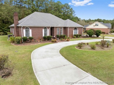 This beautifully maintained 3-bedroom, 3-bath all-brick home is on Baywood Golf Club in North Carolina - for sale on GolfHomes.com, golf home, golf lot