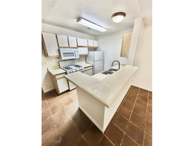 AWESOME ONE BEDROOM WALK UP CONDO IN GUARD GATED COMMUNITY JUST on Canyon Gate Country Club in Nevada - for sale on GolfHomes.com, golf home, golf lot