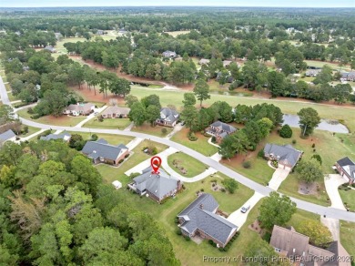 This beautifully maintained 3-bedroom, 3-bath all-brick home is on Baywood Golf Club in North Carolina - for sale on GolfHomes.com, golf home, golf lot