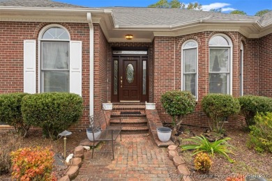 This beautifully maintained 3-bedroom, 3-bath all-brick home is on Baywood Golf Club in North Carolina - for sale on GolfHomes.com, golf home, golf lot